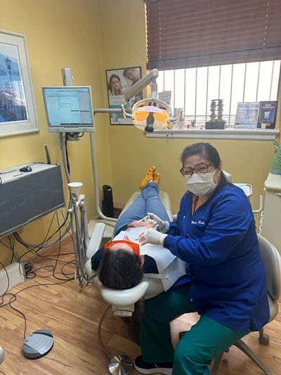 Dentist and patent after a laser dentistry procedure at Schlobohm Dental